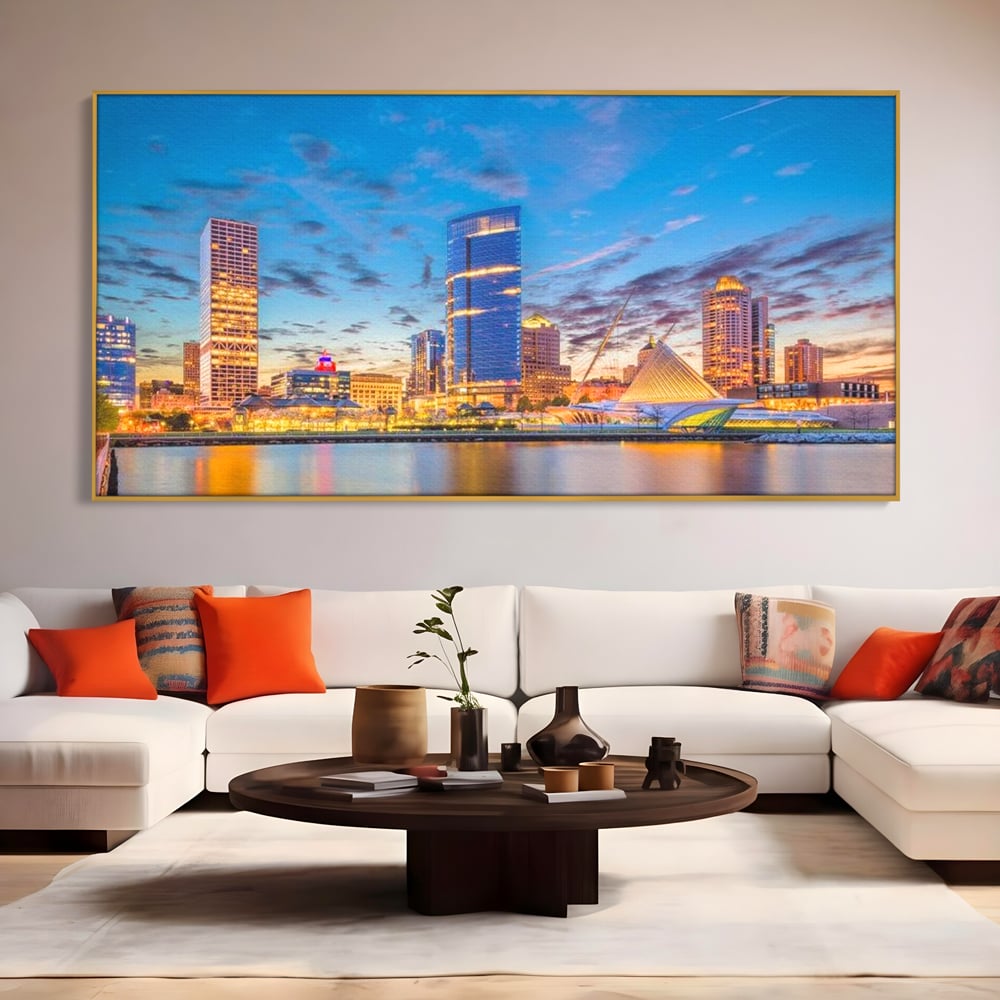 Tablou canvas cu panorami urbana nocturna milwaukee pe apa, in rama de aluminiu auriu, pe perete intr-un living